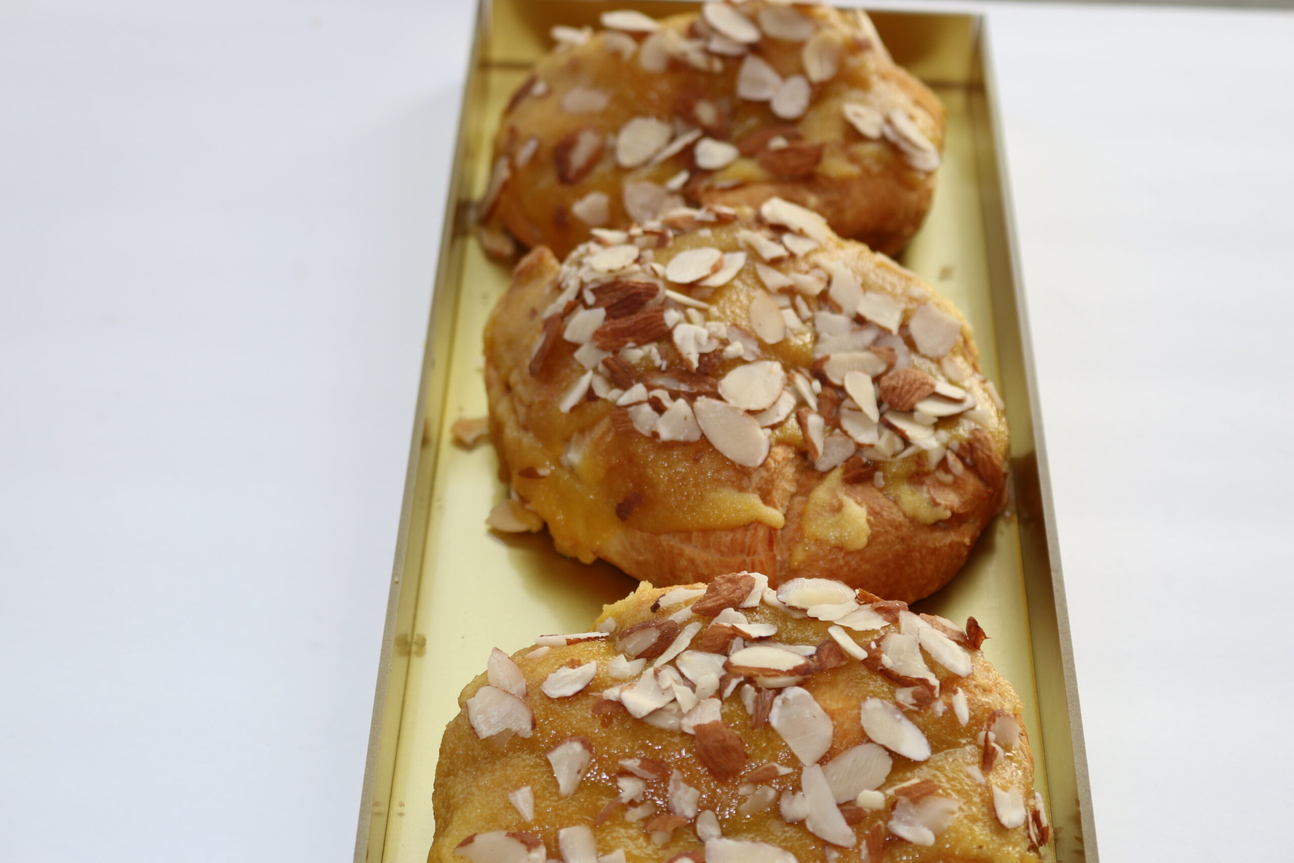 Fresh almond-topped muffin
