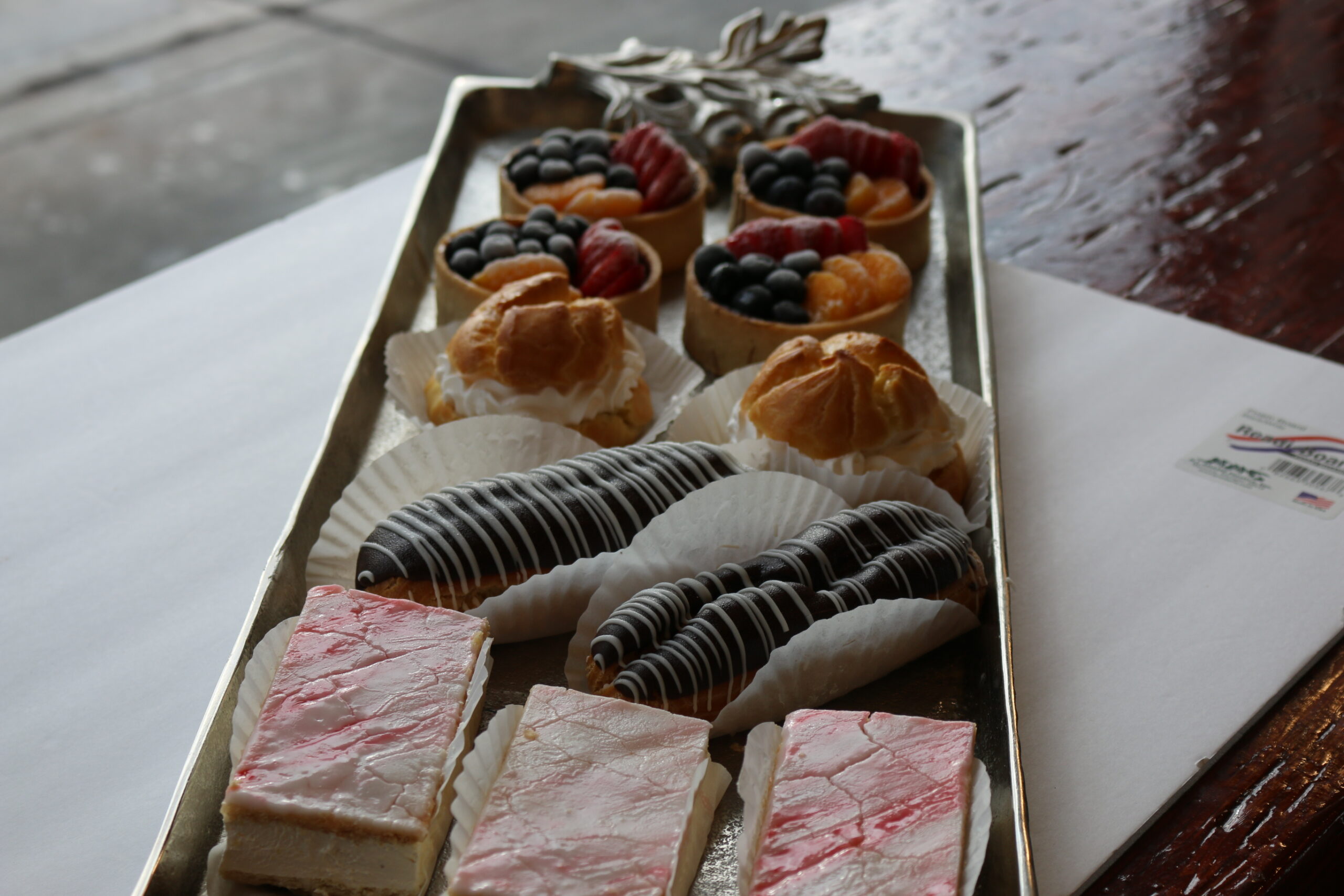 Assorted freshly baked muffins in a display tray